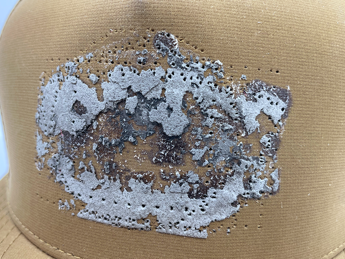 Blackhawk Caramel with Patch Residue and Stitch Holes